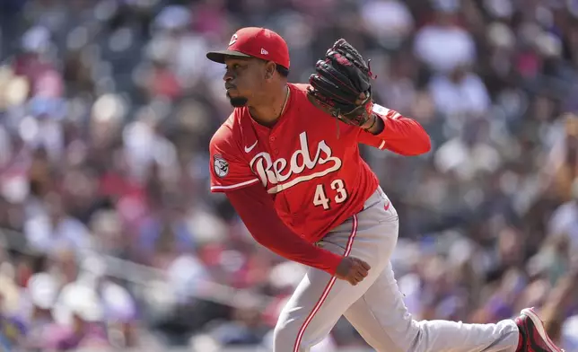 FILE - Cincinnati Reds relief pitcher Alexis Díaz works in the eighth inning of a baseball game, April 26, 2025, in Denver. (AP Photo/David Zalubowski, File)