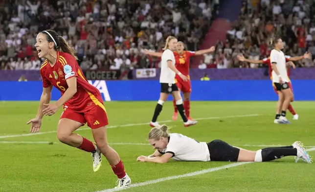 Spain's Aitana Bonmati celebrates after scoring the opening goal during the Women's Euro 2025 semifinals soccer match between Germany and Spain at Stadion Letzigrund in Zurich, Switzerland, Wednesday, July 23, 2025. (AP Photo/Alessandra Tarantino)
