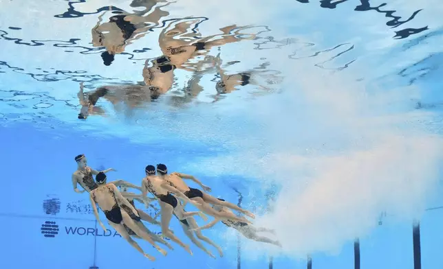 Team China compete in the team technical final of artistic swimming at the World Aquatics Championships in Singapore, Tuesday, July 22, 2025. (AP Photo/Lee Jin-man)