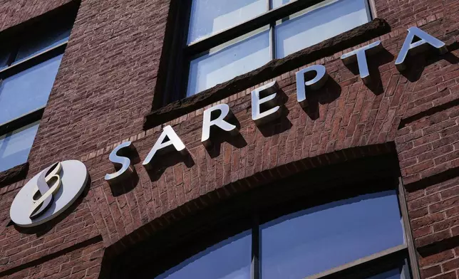 The name and logo of Sarepta Therapeutics is displayed on the company's headquarters, Monday, July 28, 2025, in Cambridge, Mass. (AP Photo/Charles Krupa)