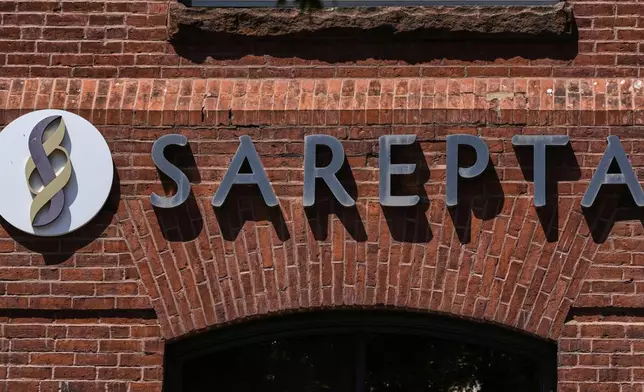 The name and logo of Sarepta Therapeutics is displayed on the company's headquarters, Monday, July 28, 2025, in Cambridge, Mass. (AP Photo/Charles Krupa)
