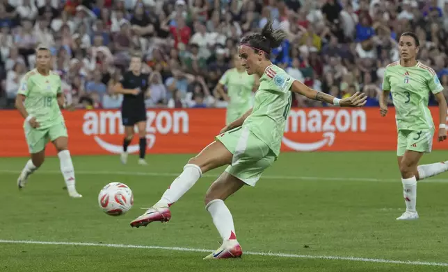 Italy's Barbara Bonansea scores her side's opening goal during the Women's Euro 2025 semifinals soccer match between England and Italy at Stade de Geneve in Geneva, Switzerland, Tuesday, July 22, 2025. (AP Photo/Martin Meissner)