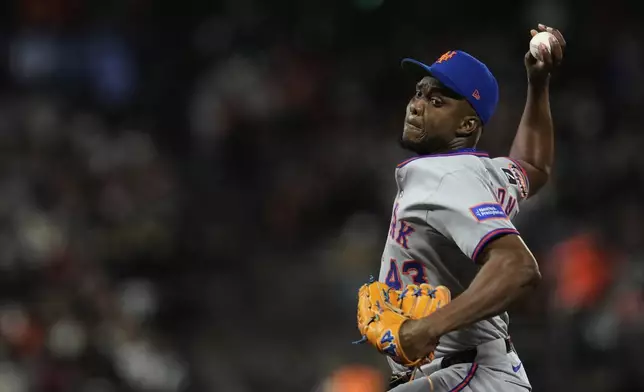 New York Mets pitcher Huascar Brazobán throws to a San Francisco Giants batter during the sixth inning of a baseball game Friday, July 25, 2025, in San Francisco. (AP Photo/Godofredo A. Vásquez)
