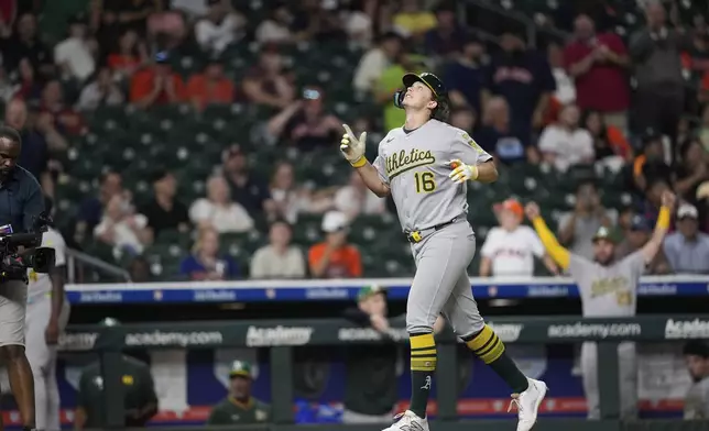 Athletics' Nick Kurtz celebrates after hitting a three-run home against the Houston Astros during the ninth inning of a baseball game Friday, July 25, 2025, in Houston. (AP Photo/David J. Phillip)
