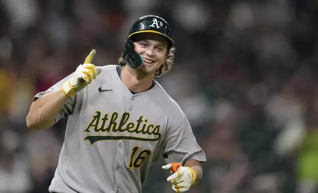 Athletics' Nick Kurtz celebrates after hitting a three-run home against the Houston Astros during the ninth inning of a baseball game Friday, July 25, 2025, in Houston. (AP Photo/David J. Phillip)