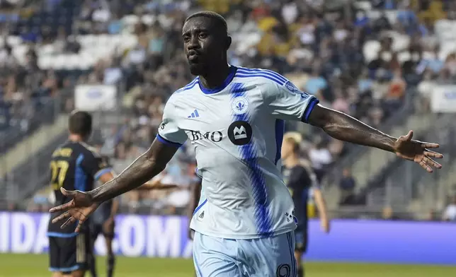 CORRECTS TEAM NAME TO CF MONTREAL NOT TORONTO FC - CF Montreal 's Prince Owusu reacts after scoring a goal during the first half of an MLS soccer match against the Philadelphia Union, Wednesday, July 16, 2025, in Chester, Pa. (AP Photo/Matt Slocum)