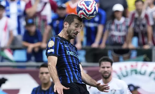 Inter Milan's Henrikh Mkhitaryan heads the ball during the Club World Cup round of 16 soccer match between Inter Milan and Fluminense in Charlotte, N.C., Monday, June 30, 2025. (AP Photo/Chris Carlson)