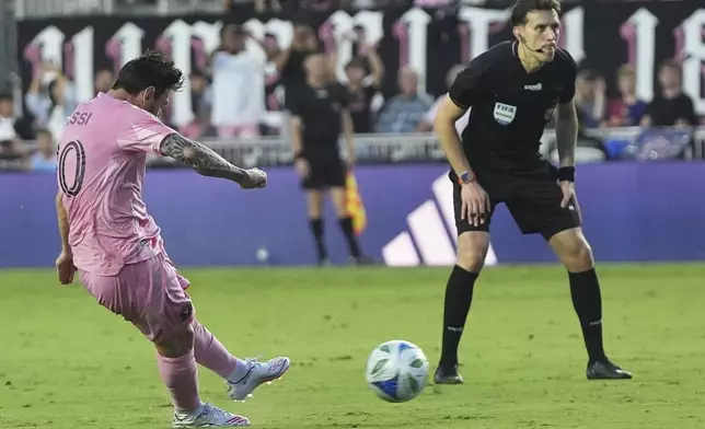 Inter Miami forward Lionel Messi (10) takes a free kick to score a goal during the first half of an MLS soccer match against Nashville SC, Saturday, July 12, 2025, in Fort Lauderdale, Fla. (AP Photo/Lynne Sladky)