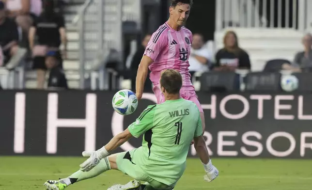 Nashville SC goalkeeper Joe Willis (1) saves a shot on the goal by Inter Miami forward Tadeo Allende during the first half of an MLS soccer match, Saturday, July 12, 2025, in Fort Lauderdale, Fla. (AP Photo/Lynne Sladky)