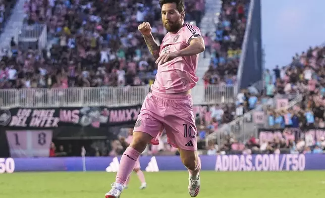 Inter Miami forward Lionel Messi (10) reacts after scoring a goal during the first half of an MLS soccer match against Nashville SC, Saturday, July 12, 2025, in Fort Lauderdale, Fla. (AP Photo/Lynne Sladky)