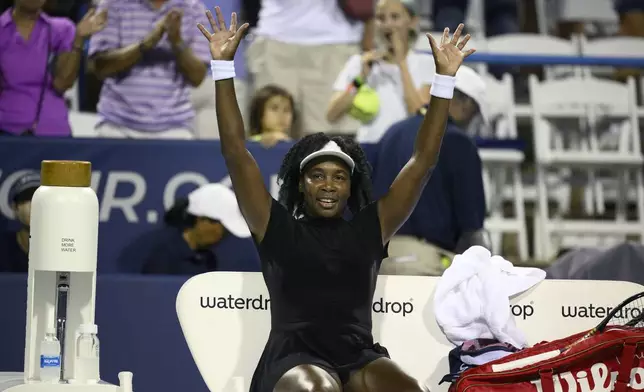 Venus Williams waves to the crowd after she lost to Magdalena Frech, of Poland, during a match at the Citi Open tennis tournament Thursday, July 24, 2025, in Washington. (AP Photo/Nick Wass)
