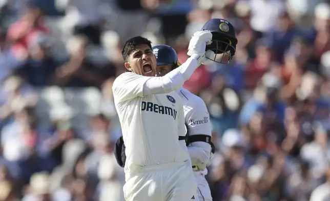India's captain Shubman Gill celebrates after scoring a century on day one of the second cricket test match between England and India at Edgbaston in Birmingham, England, Wednesday, July 2, 2025. (AP Photo/Scott Heppell)