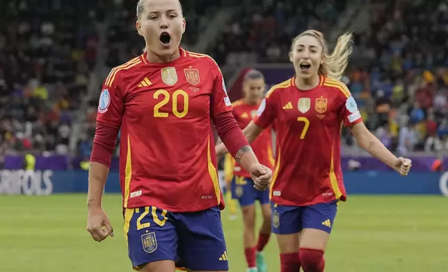 Spain's Claudia Pina celebrates after scoring her side's fifth goal during the Euro 2025, group B, soccer match between Spain and Belgium at Arena Thun in Thun, Switzerland, Monday, July 7, 2025. (AP Photo/Martin Meissner)