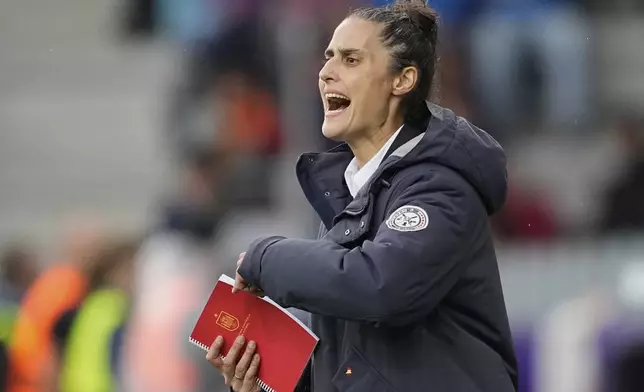Spain head coach Montserrat Tome reacts during the Euro 2025, group B, soccer match between Spain and Belgium at Arena Thun in Thun, Switzerland, Monday, July 7, 2025. (AP Photo/Martin Meissner)