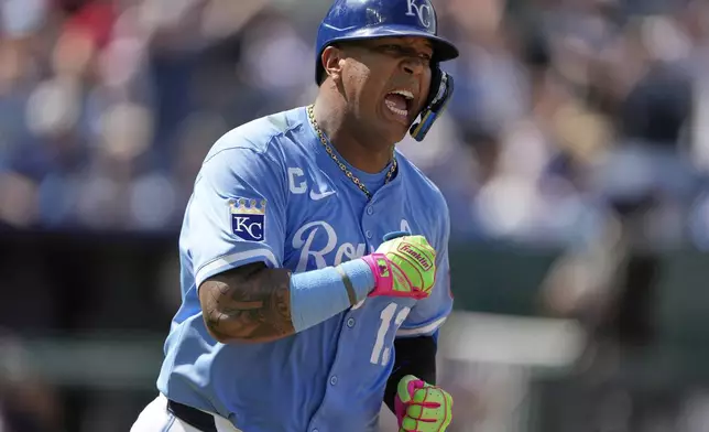 Kansas City Royals' Salvador Perez celebrates as he runs to first after hitting an RBI single to win the baseball game during the 10th inning against the Atlanta Braves, Wednesday, July 30, 2025, in Kansas City, Mo. (AP Photo/Charlie Riedel)