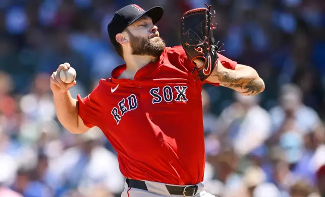 Boston Red Sox starter Lucas Giolito throws during the first inning of a baseball game against the Chicago Cubs, Friday, July 18, 2025, in Chicago. (AP Photo/Paul Beaty)