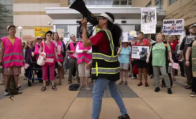 Supporters of Kilmar Abrego Garcia rally outside of the U.S. District Court in Greenbelt, Md., where a hearing was scheduled to be held on returning him to Maryland, Monday, July 7, 2025. (AP Photo/Mark Schiefelbein)