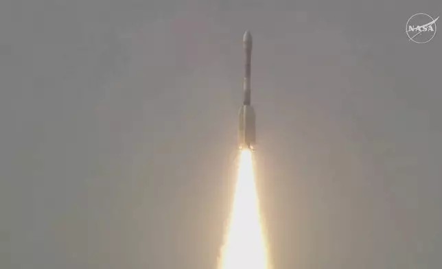This image provided by NASA shows an Earth-mapping satellite, the first collaborative mission between NASA and the Indian Space Research Organization, launching from India on Wednesday, July 30, 2025. (NASA via AP)