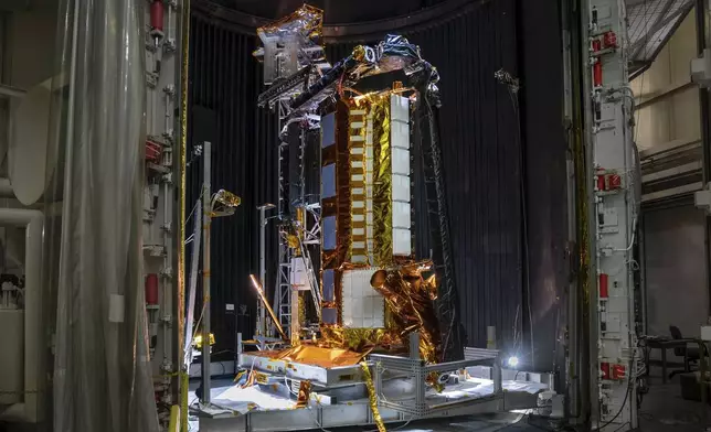 This photo provided by NASA shows part of the NISAR (NASA-ISRO Synthetic Aperture Radar) satellite resting in a thermal vacuum chamber in August 2020 at NASA's Jet Propulsion Laboratory in La Cañada Flintridge, Calif. (NASA/JPL-Caltech via AP)
