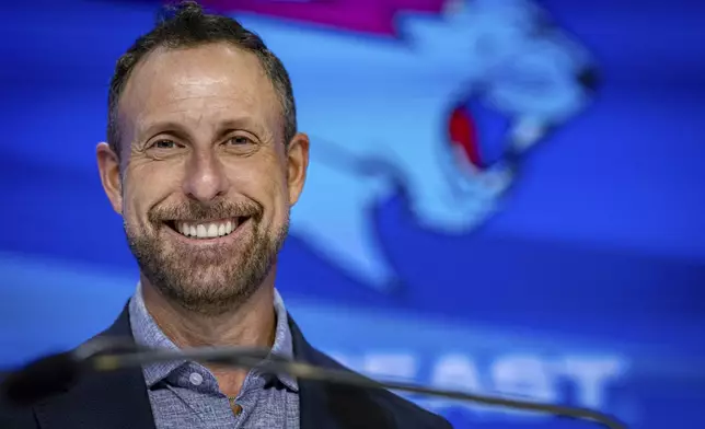 Jeffrey Housenbold, CEO and president of MrBeast, poses for a picture during a Nasdaq closing bell ceremony Wednesday, July 23, 2025, in New York's Times Square. (AP Photo/Stefan Jeremiah)