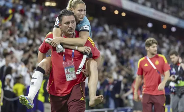 Germany's Sarai Linder is carried from the pitch after suffering an injury, during the UEFA Women's EURO 2025 quarterfinals soccer match between France and Germany at the St. Jakob-Park stadium in Basel, Switzerland, on Saturday, July 19, 2025. (Michael Buholzer/Keystone via AP)