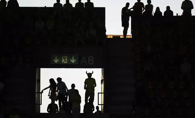 Fans in the stands wait for the start of the Women's Euro 2025 quarterfinals soccer match between Sweden and England at Stadion Letzigrund in Zurich, Switzerland, Thursday, July 17, 2025. (AP Photo/Alessandra Tarantino)