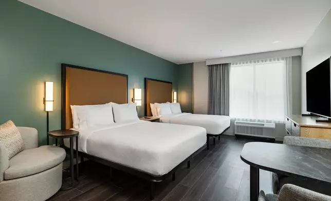 2 queen beds studio suite at LivSmart Studios by Hilton Tullahoma. The hotel is the first for LivSmart Studios, a new extended-stay brand that blends the comfort and functionality of studio apartment-style accommodations with the consistency, value and hospitality travelers expect when they stay with Hilton. (Photo: Hilton)