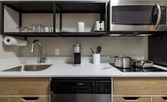 In-suite kitchen at LivSmart Studios by Hilton Tullahoma. The hotel is the first for LivSmart Studios, a new extended-stay brand that blends the comfort and functionality of studio apartment-style accommodations with the consistency, value and hospitality travelers expect when they stay with Hilton. (Photo: Hilton)