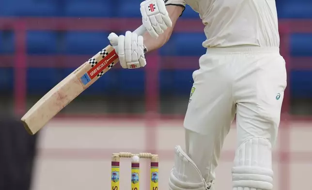 Australia's Beau Webster plays a shot against West Indies during day one of the second cricket Test match at National Cricket Stadium in St. George's, Grenada, Thursday, July 3, 2025. (AP Photo/Ricardo Mazalan)