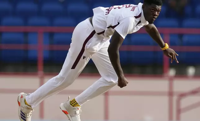 West Indies' Alzarri Joseph bowls against West Indies during day one of the second cricket Test match at National Cricket Stadium in St. George's, Grenada, Thursday, July 3, 2025. (AP Photo/Ricardo Mazalan)