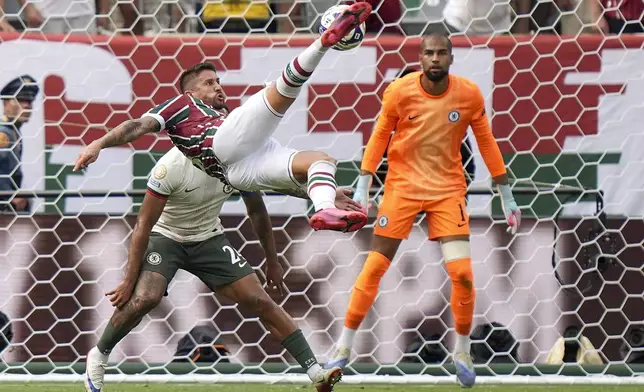 Fluminense's Everaldo attempts a shot on goal that went high against Chelsea during the second half of a Club World Cup semifinal soccer match in East Rutherford, N.J., Tuesday, July 8, 2025. (AP Photo/Frank Franklin II)