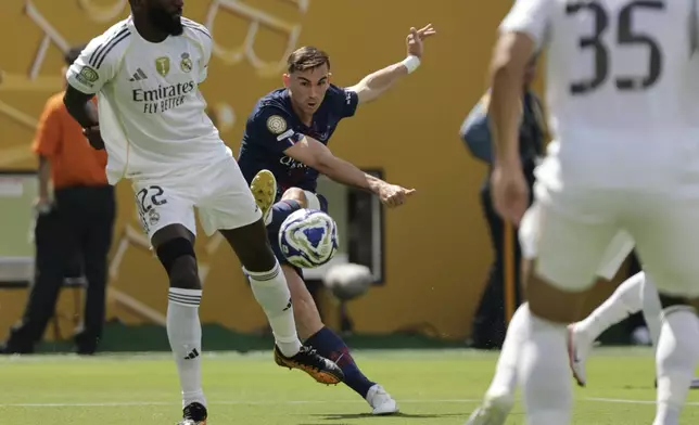 Paris Saint-Germain's Fabian Ruiz scores his side's opening goal during the Club World Cup semifinal soccer match between PSG and Real Madrid in East Rutherford, N.J., Wednesday, July 9, 2025. (AP Photo/Adam Hunger)
