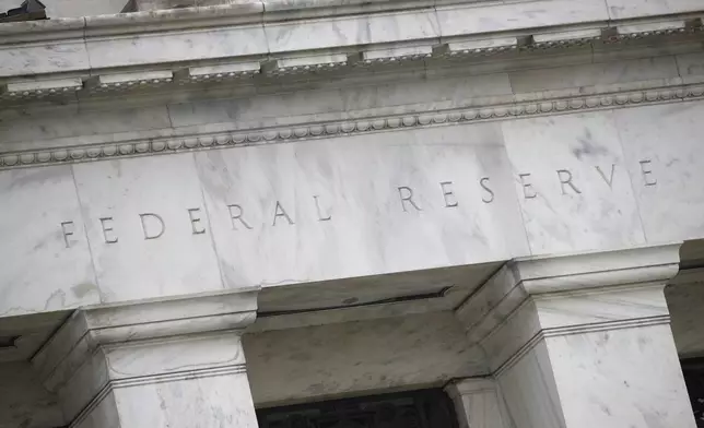 FILE - The Federal Reserve building in seen in Washington, May 22, 2020. (AP Photo/Patrick Semansky, File)