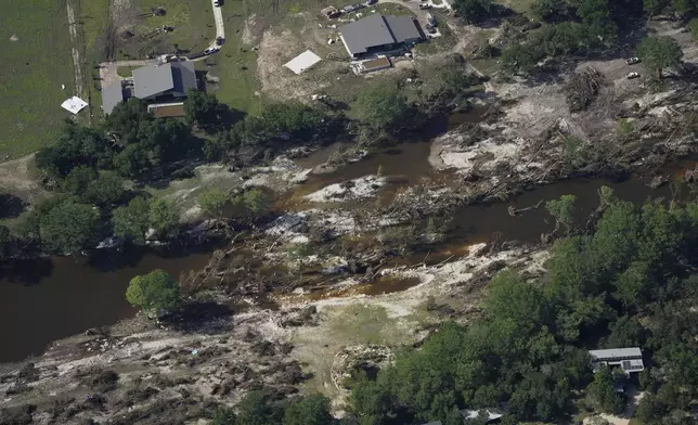Damage is seen next to the Guadalupe River on Tuesday, July 8, 2025, after a flash flood swept through the area near Ingram, Texas. (AP Photo/Ashley Landis)