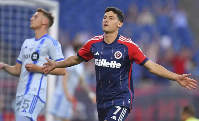 New England Revolution forward Tomás Chancalay (7) celebrates after scoring in front of CF Montréal defender Brandan Craig (5) during the first half of an MLS soccer match, Friday, July 25, 2025, in Foxborough, Mass. (AP Photo/Steven Senne)