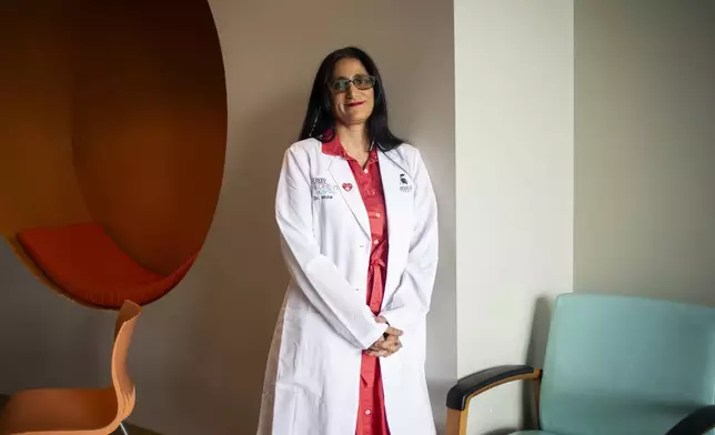 Dr. Mona Hanna, creator of the Flint Rx Kids program, at the Hurley's Children Clinic ahead of the Flint Rx Kids Baby Parade on July 25, 2025 in Flint, Mich. (AP Photo/Emily Elconin)