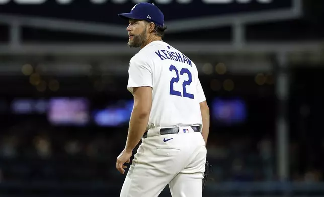 Los Angeles Dodgers pitcher Clayton Kershaw reacts after striking out Chicago White Sox's Vinny Capra during the sixth inning for his 3,000th career strikeout Wednesday, July 2, 2025, in Los Angeles. (AP Photo/Kevork Djansezian)