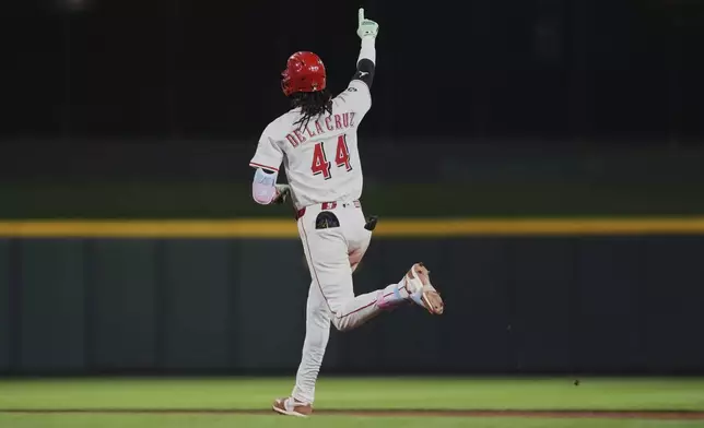 Cincinnati Reds' Elly De La Cruz celebrates after hitting a solo home run during the eighth inning of a baseball game against the New York Yankees, Monday, June 23, 2025, in Cincinnati. (AP Photo/Joshua A. Bickel)