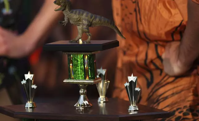 The men's championship trophy is seen in the winner's circle after the "T-Rex World Championship Races" at Emerald Downs, Sunday, June 29, 2025, in Auburn, Wash. (AP Photo/Lindsey Wasson)