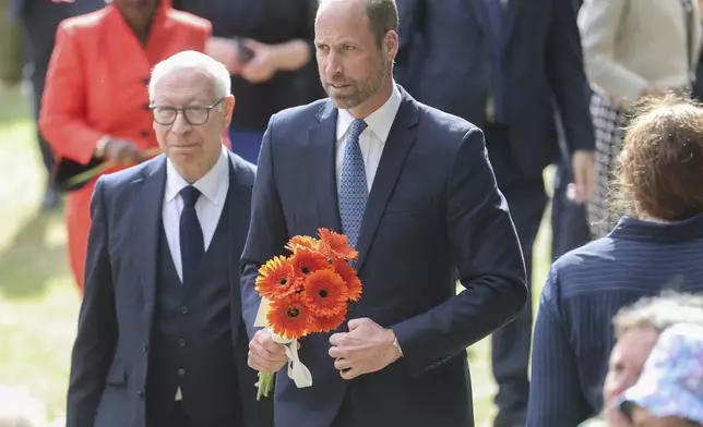 Britain's Prince William attends a memorial service for the 20th Anniversary of the 7th of July 2005 bombings at Memorial Gardens at Hyde Park, London, July 7, 2025. (Chris Jackson/Pool Photo via AP)