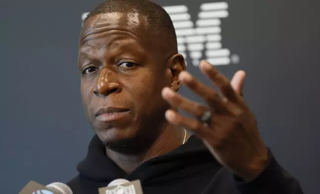 Atlanta Falcons Coach Raheem Morris addresses members of the press prior to the first open training NFL football camp on Thursday, July 24, 2022, in Flowery Branch, Ga. (Miguel Martinez/Atlanta Journal-Constitution via AP)