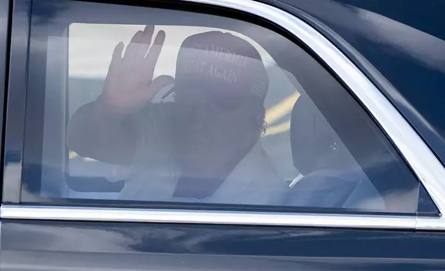 FILE - President Donald Trump waves as he departs in his motorcade from the Trump International Golf Club, March 1, 2025, in West Palm Beach, Fla. (AP Photo/Alex Brandon, File)