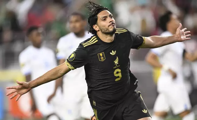 Mexico forward Raúl Jiménez (9) celebrates scoring his team's first goal during the second half of a CONCACAF Gold Cup semifinal soccer match Wednesday, July 2, 2025, in Santa Clara, Calif. (AP Photo/Eakin Howard)