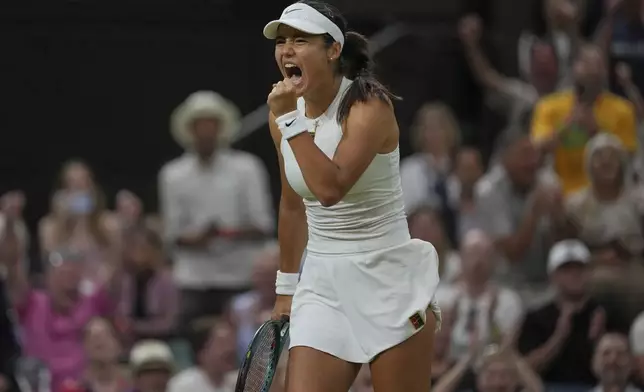 Emma Raducanu of Britain reacts after winning a point against Aryna Sabalenka of Belarus during a third round women's singles match at the Wimbledon Tennis Championships in London, Friday, July 4, 2025. (AP Photo/Kin Cheung)