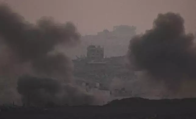 Smokes rises after an explosion during Israeli air and ground operations in the Gaza Strip as seen from southern Israel, Tuesday, July 22, 2025. (AP Photo/Leo Correa)