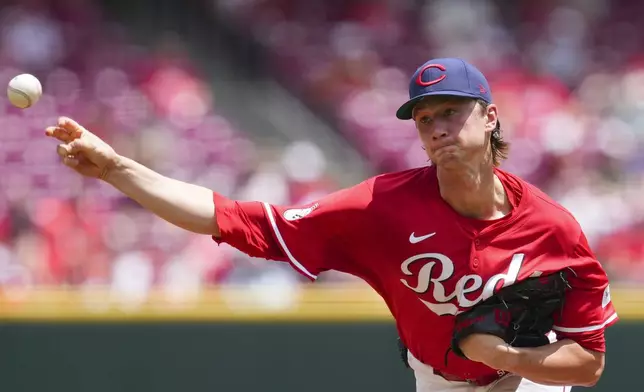 Cincinnati Reds pitcher Brady Singer throws during the third inning of a baseball game against the Tampa Bay Rays, Sunday, July 27, 2025, in Cincinnati. (AP Photo/Jeff Dean)