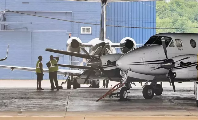 Jets are pictured at the Youngstown - Warren Regional Airport in Vienna, Ohio, Monday, June 30, 2025, where a day earlier a plane crashed on take off killing all onboard. (AP Photo/Sue Ogrocki)