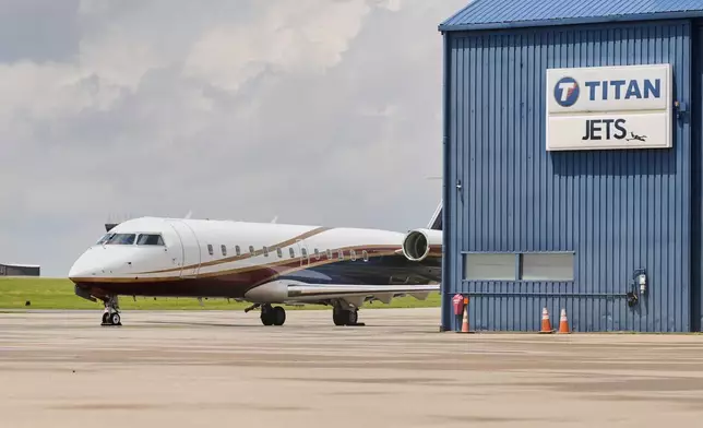 A jet is pictured at the Youngstown - Warren Regional Airport in Vienna, Ohio, Monday, June 30, 2025, where a day earlier a plane crashed on take off killing all onboard. (AP Photo/Sue Ogrocki)