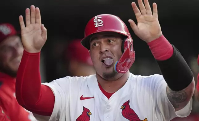 St. Louis Cardinals' Yohel Pozo celebrates after scoring during the fourth inning of a baseball game against the Miami Marlins Monday, July 28, 2025, in St. Louis. (AP Photo/Jeff Roberson)