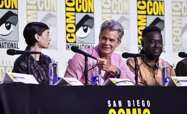 Sydney Chandler, from left, Timothy Olyphant, and Babou Ceesay attend a panel for "Alien: Earth" during Comic-Con International on Friday, July 25, 2025, in San Diego. (Photo by Richard Shotwell/Invision/AP)